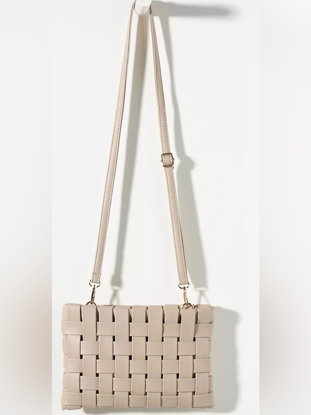 Anthropologie off white Lindy Woven Clutch. (Bags25)